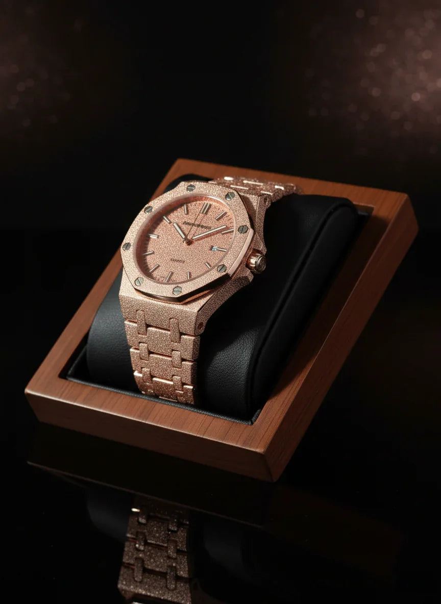 Rose gold watch in a wooden box on a dark background