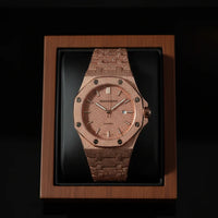 Wooden watch in a display box on a black background