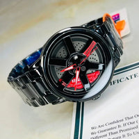 Black watch with red accents on a newspaper background
